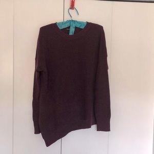 Burgundy sweater with a diagonal hem. Only worn once.